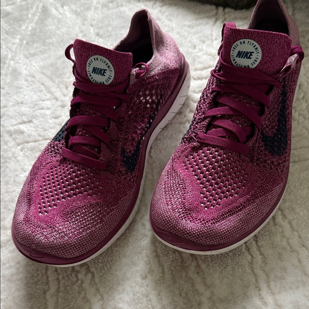 Nike Women’s Flyknit Athletic Shoes - Magenta